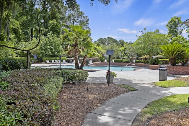 700 Daniel Ellis Dr Unit 10305, Charleston, SC 29412 - view of community featuring a swimming pool, a patio, and view of scattered trees