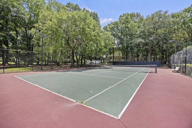 700 Daniel Ellis Dr Unit 10305, Charleston, SC 29412 - view of tennis court with community basketball court and view of wooded area