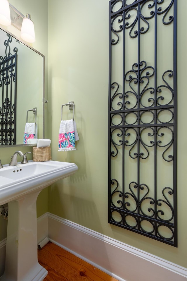 bathroom with wood finished floors