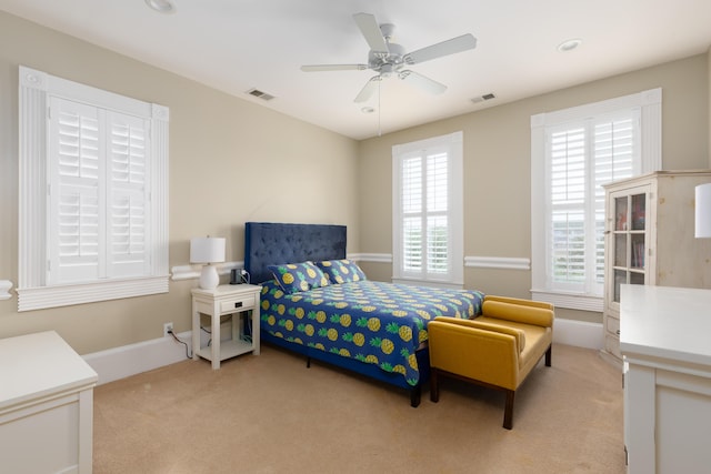 bedroom featuring light colored carpet, baseboards, ceiling fan, and recessed lighting