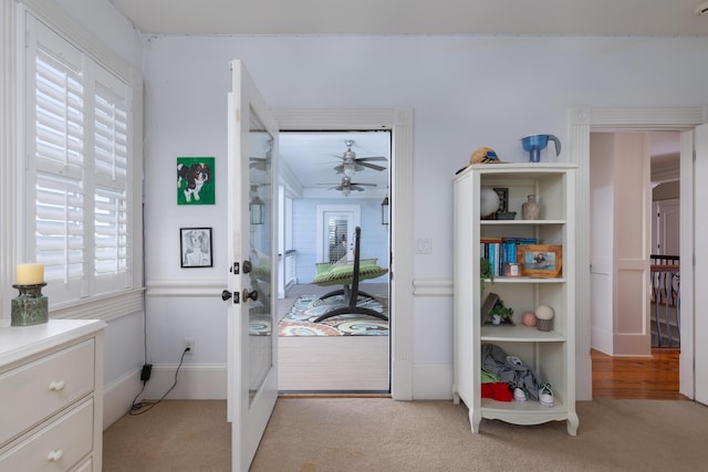 bedroom with light carpet and french doors