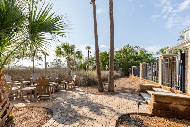 view of patio featuring fence