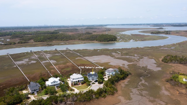 aerial overview of property's location featuring a nearby body of water