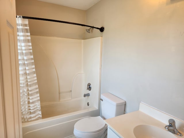 full bath with shower / bath combination with curtain, toilet, and vanity