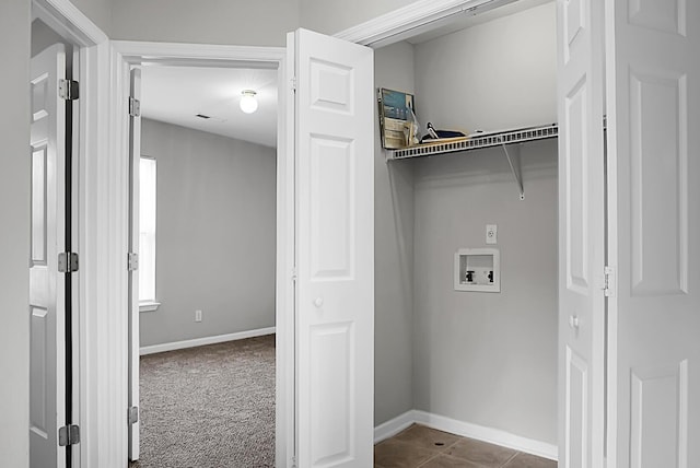 washroom featuring baseboards, washer hookup, laundry area, and carpet flooring