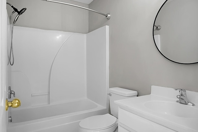 full bath featuring vanity, toilet, and bathtub / shower combination