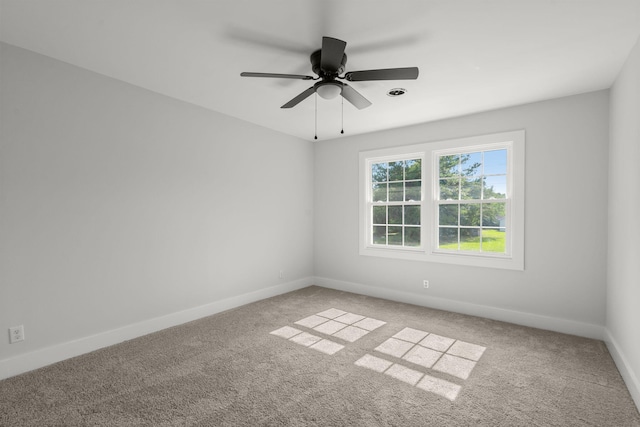 unfurnished room with baseboards, carpet floors, and ceiling fan