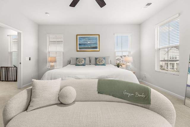 carpeted bedroom featuring ceiling fan