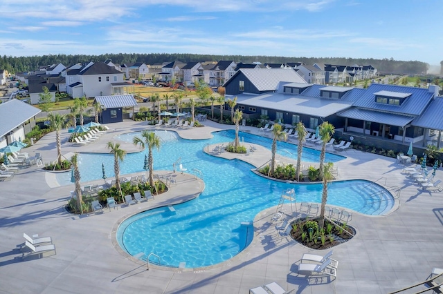 view of swimming pool featuring a patio