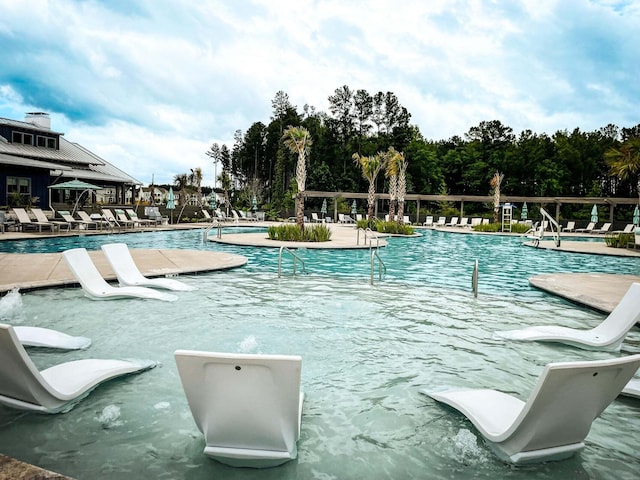 view of pool featuring a patio area