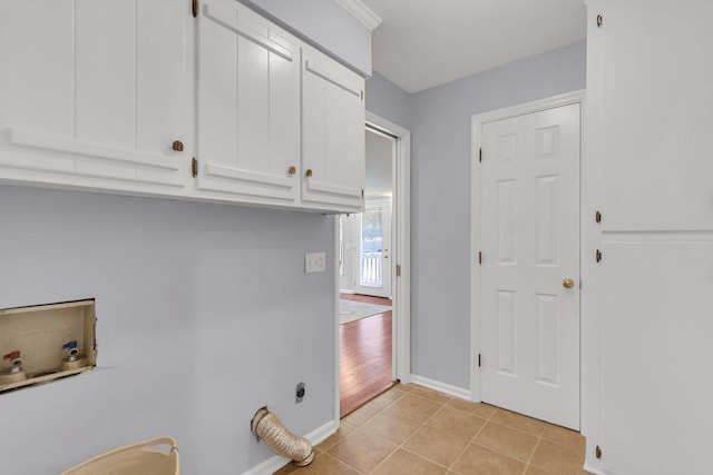 washroom featuring hookup for a washing machine, light hardwood / wood-style flooring, cabinets, and electric dryer hookup