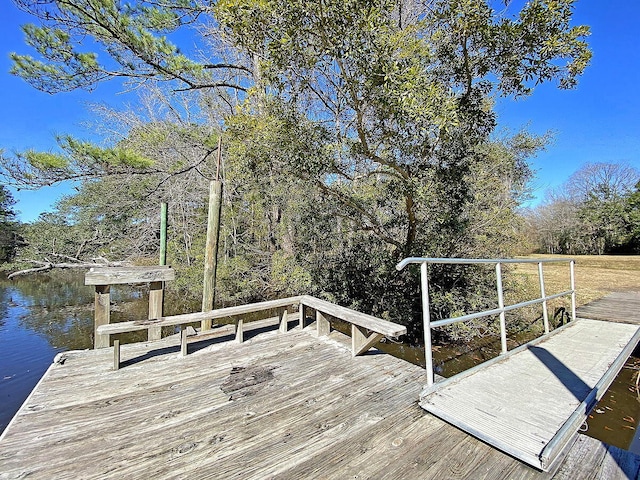 view of dock with a water view