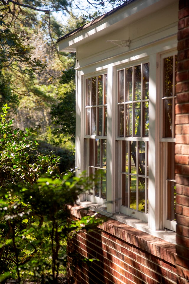 view of exterior entry featuring french doors