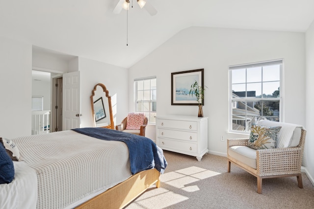 bedroom with baseboards, lofted ceiling, carpet, and ceiling fan