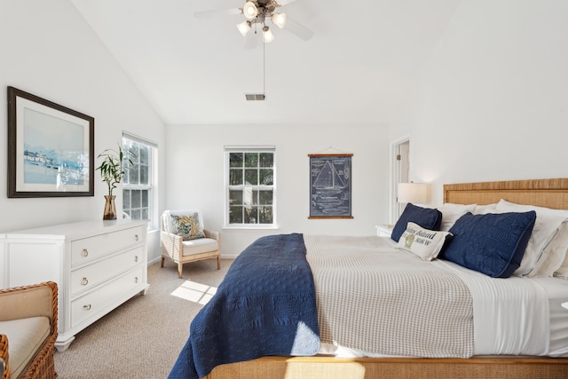 bedroom with a ceiling fan, visible vents, baseboards, vaulted ceiling, and light colored carpet