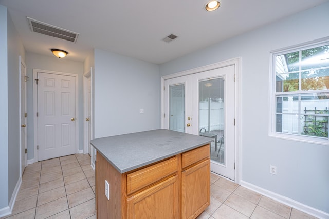 1401 Elm Hall Cir, Summerville, SC 29483 - kitchen featuring light tile patterned floors, french doors, baseboards, a center island, and recessed lighting