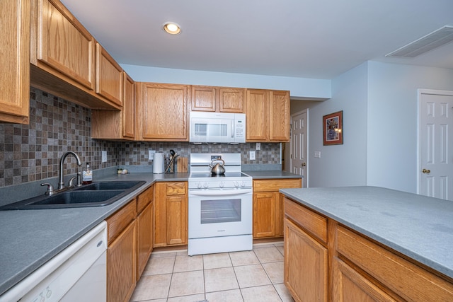 1401 Elm Hall Cir, Summerville, SC 29483 - kitchen with white appliances, a sink, light tile patterned flooring, tasteful backsplash, and recessed lighting