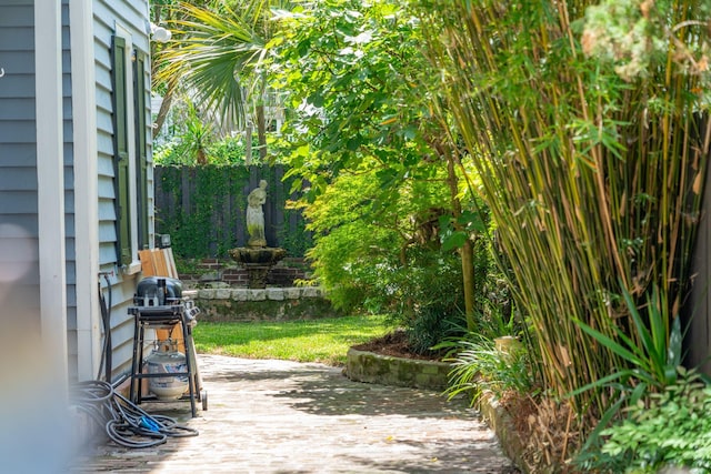 view of patio with a grill