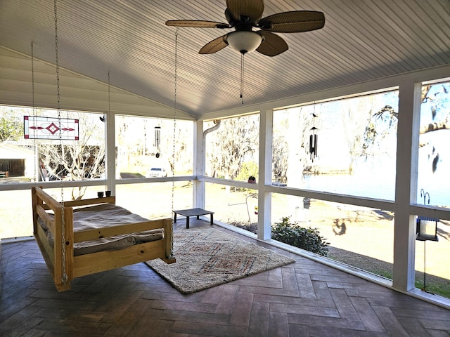 sunroom / solarium with vaulted ceiling and ceiling fan