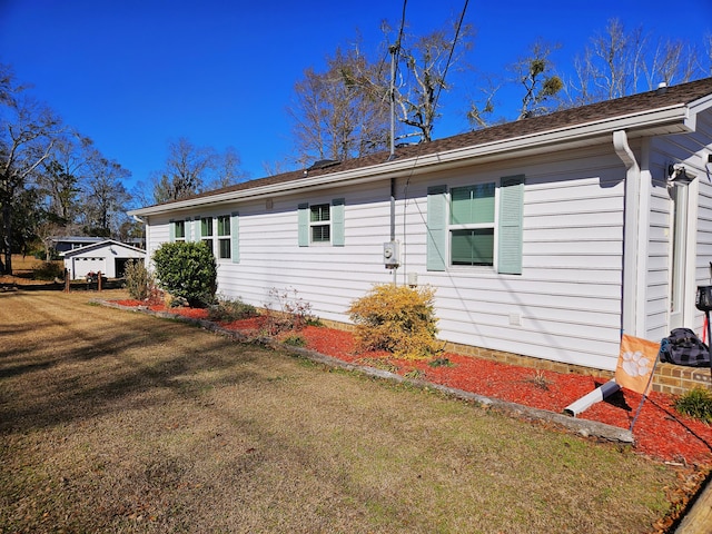 ranch-style house with a front yard