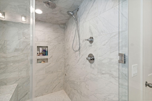 bathroom featuring an enclosed shower