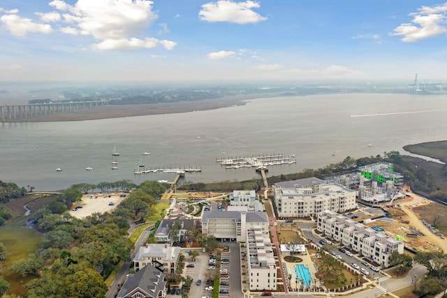 birds eye view of property featuring a water view