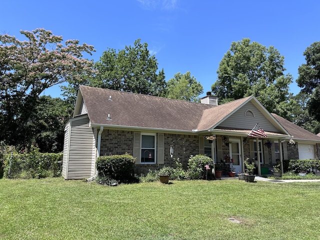 ranch-style house with a front lawn