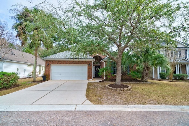 view of front of home featuring a garage, concrete driveway, brick siding, and a front lawn