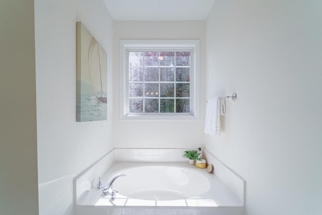 bathroom featuring a bath