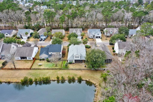 bird's eye view with a water view and a residential view