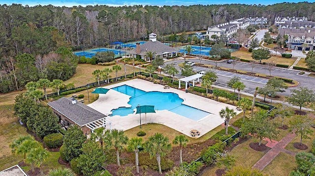 aerial view featuring a wooded view