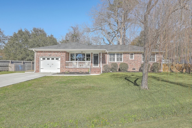 ranch-style home with a front lawn, a porch, and a garage