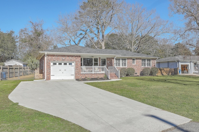 ranch-style home with a porch and a front yard