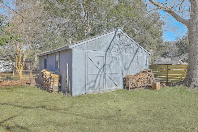 view of outdoor structure with a yard