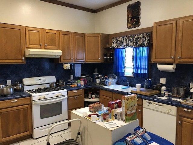 kitchen featuring light tile patterned floors, white appliances, sink, backsplash, and ornamental molding