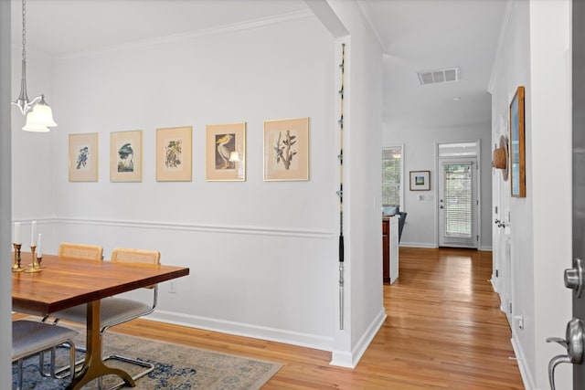 3000 Treadwell St, Mount Pleasant, SC 29466 - dining area featuring light wood-style floors, baseboards, and ornamental molding