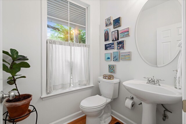 3000 Treadwell St, Mount Pleasant, SC 29466 - half bath with toilet, baseboards, and wood finished floors