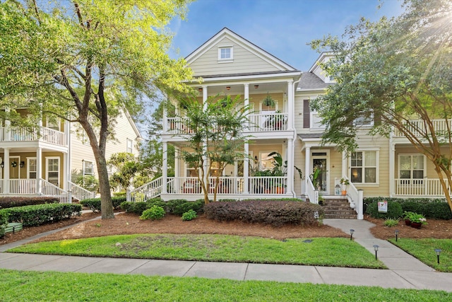 3000 Treadwell St, Mount Pleasant, SC 29466 - neoclassical home with a balcony and a porch