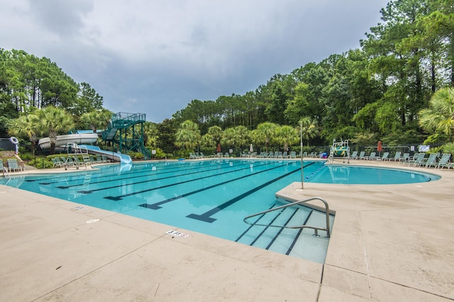 3000 Treadwell St, Mount Pleasant, SC 29466 - community pool with a water slide, a patio, and view of wooded area