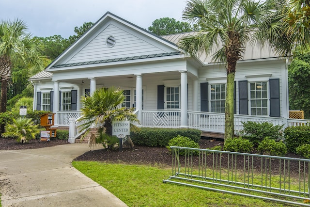 3000 Treadwell St, Mount Pleasant, SC 29466 - neoclassical / greek revival house featuring a porch, a standing seam roof, and metal roof