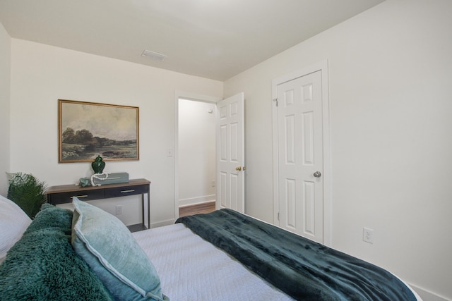 bedroom featuring baseboards