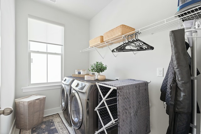 washroom with washing machine and dryer