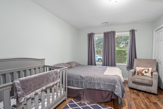 bedroom with wood-type flooring