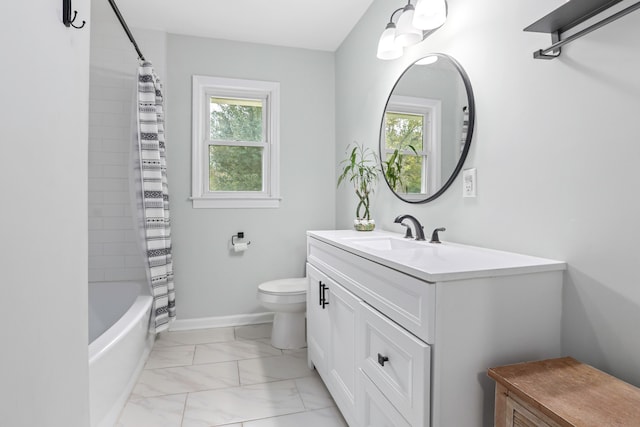 full bathroom with shower / tub combo with curtain, vanity, a healthy amount of sunlight, and toilet