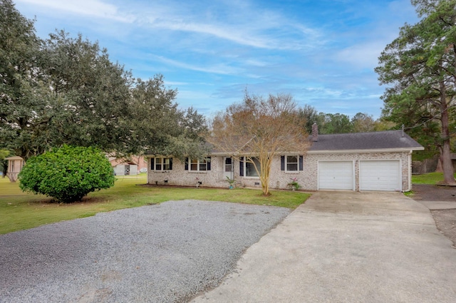 single story home featuring a garage and a front lawn