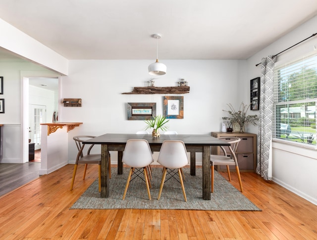 dining room featuring light hardwood / wood-style flooring