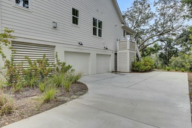 view of property exterior with a garage