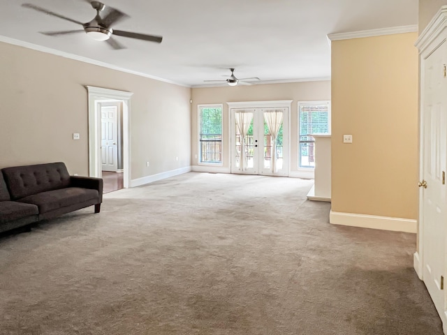 1514 Reevesville Rd, Bowman, SC 29018 - unfurnished living room featuring ceiling fan, ornamental molding, carpet flooring, baseboards, and french doors