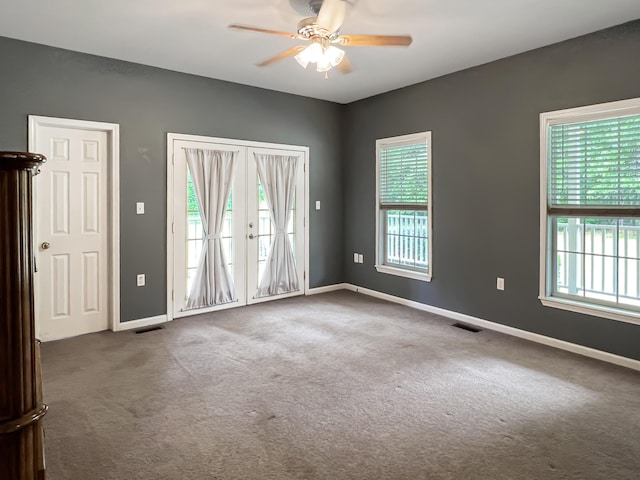 1514 Reevesville Rd, Bowman, SC 29018 - empty room with ceiling fan, healthy amount of natural light, and carpet floors
