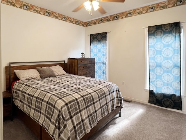 1514 Reevesville Rd, Bowman, SC 29018 - carpeted bedroom with baseboards and ceiling fan